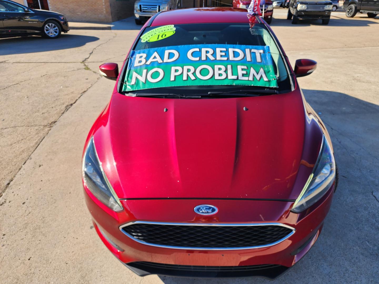 2016 BURGUNDY Ford Focus SE (1FADP3F25GL) with an 2.0L L4 DOHC 16V engine, AUTO transmission, located at 2660 S.Garland Avenue, Garland, TX, 75041, (469) 298-3118, 32.885551, -96.655602 - Welcome to DallasAutos4Less, one of the Premier BUY HERE PAY HERE Dealers in the North Dallas Area. We specialize in financing to people with NO CREDIT or BAD CREDIT. We need proof of income, proof of residence, and a ID. Come buy your new car from us today!! This is a Super Clean 2016 FORD FOCUS - Photo#8